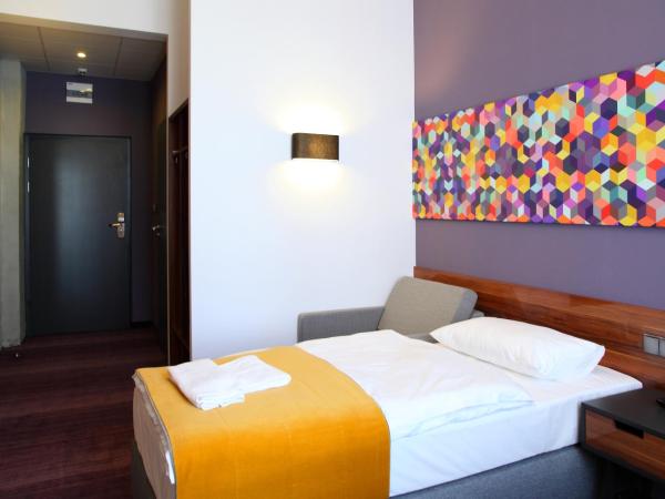 Hotel Tobaco Łódź : photo 9 de la chambre petite chambre simple