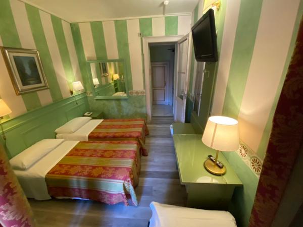 Artua'&Solferino : photo 4 de la chambre chambre quadruple standard