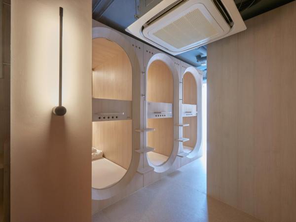 KINN Capsule : photo 3 de la chambre capsule simple dans chambre mixte de 12 capsules - rez-de-chaussée