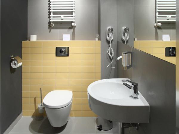 Hotel Tobaco Łódź : photo 10 de la chambre petite chambre simple