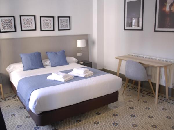 La Perla Granada Suites : photo 5 de la chambre chambre double supérieure