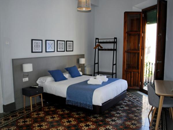 La Perla Granada Suites : photo 4 de la chambre chambre double supérieure