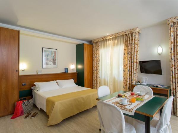 Astoria Suite Hotel : photo 1 de la chambre chambre - rez-de-chaussée 