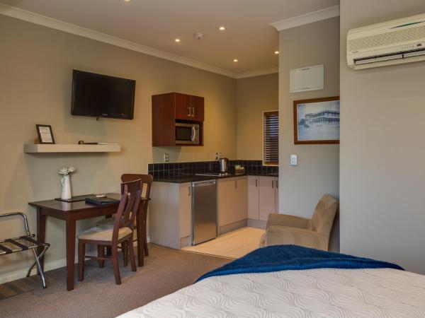 Merivale Manor : photo 9 de la chambre studio supérieur avec baignoire spa