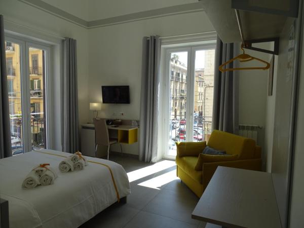 Le Quattro Stagioni - Rooms & Suite : photo 1 de la chambre chambre double ou lits jumeaux supérieure avec vue sur ville