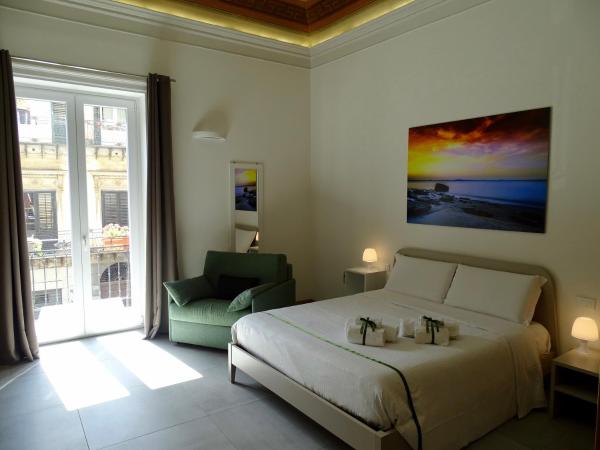 Le Quattro Stagioni - Rooms & Suite : photo 4 de la chambre suite avec balcon