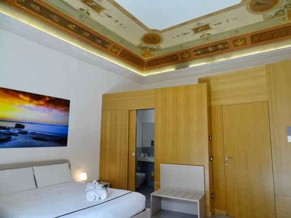 Le Quattro Stagioni - Rooms & Suite : photo 3 de la chambre suite avec balcon