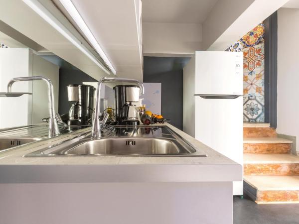 LOC HOSPITALITY Urban Den : photo 1 de la chambre petite chambre lits jumeaux