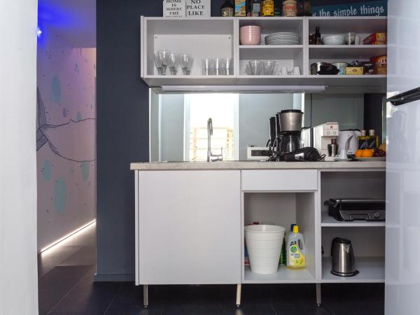 LOC HOSPITALITY Urban Den : photo 3 de la chambre petite chambre lits jumeaux