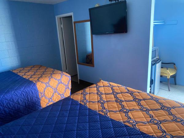 A Fisher's Inn Motel : photo 4 de la chambre chambre avec 2 lits queen-size - fumeurs
