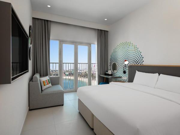Rove La Mer Beach, Jumeirah : photo 1 de la chambre chambre rover avec accès plage privée - vue sur mer - service de navette gratuit vers le dubai mall