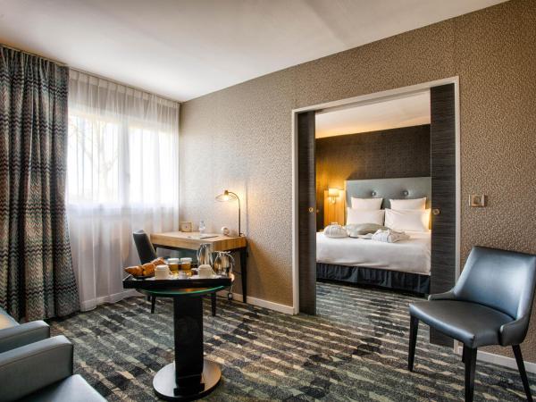 Mercure Cabourg Hôtel & Spa : photo 3 de la chambre suite privilège avec 1 lit double et 1 canapé-lit