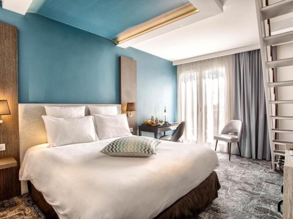 Mercure Cabourg Hôtel & Spa : photo 5 de la chambre chambre supérieure en duplex avec 1 lit double et 3 lits simples – accès au spa inclus