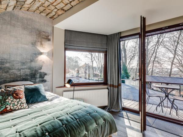 B&B La Villa d'Olne : photo 6 de la chambre chambre double ou lits jumeaux deluxe – vue sur jardin