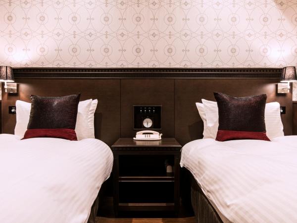 Kobe Tor Road Hotel Sanraku : photo 7 de la chambre chambre lits jumeaux premier