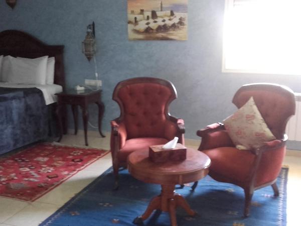 Riad TANJIL : photo 3 de la chambre chambre lit king-size avec balcon
