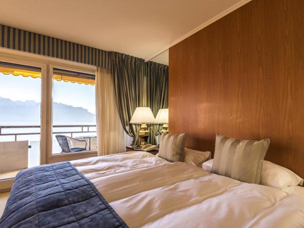 Royal Plaza Montreux : photo 10 de la chambre chambre double deluxe avec balcon - vue sur lac ou parc et lac