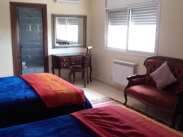 Riad TANJIL : photo 2 de la chambre chambre double ou lits jumeaux - vue sur piscine