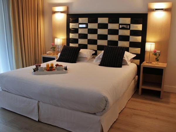 Hôtel Victoria : photo 4 de la chambre chambre double classique avec balcon - vue sur jardin