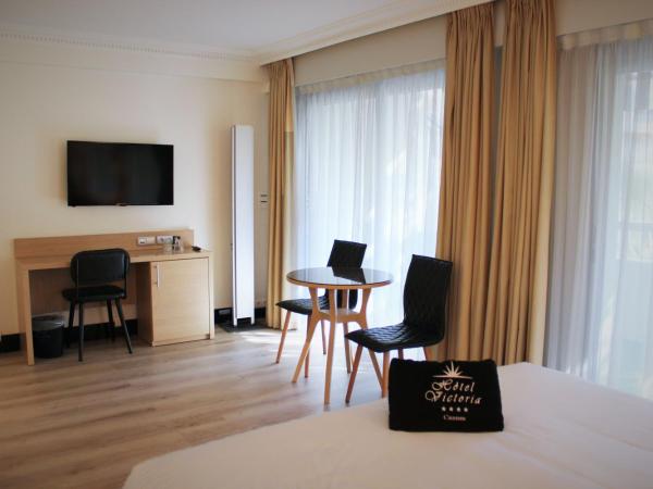 Hôtel Victoria : photo 6 de la chambre chambre double deluxe avec terrasse - vue sur jardin