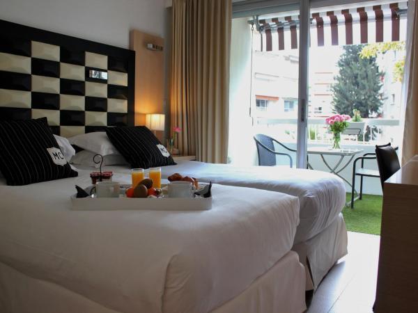 Hôtel Victoria : photo 3 de la chambre chambre double classique avec balcon - vue sur jardin