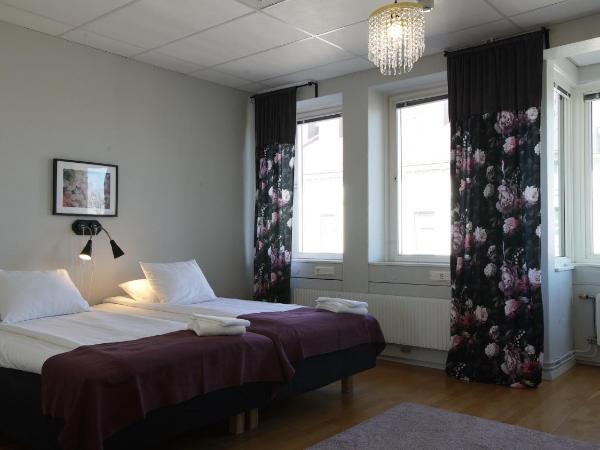 Le Mat B&B Göteborg City : photo 4 de la chambre chambre lits jumeaux avec salle de bains commune