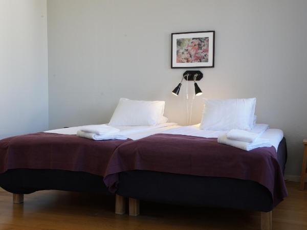 Le Mat B&B Göteborg City : photo 3 de la chambre chambre lits jumeaux avec salle de bains commune