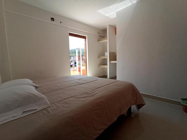 Oaxaquita la Bella : photo 2 de la chambre chambre lit king-size standard