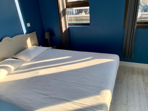 Hotel Le Petit Baigneur Palavas Plage : photo 9 de la chambre chambre double ou lits jumeaux supérieure avec vue sur ville