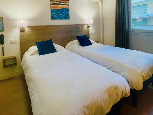 Hotel Courbet : photo 1 de la chambre chambre lits jumeaux Économique