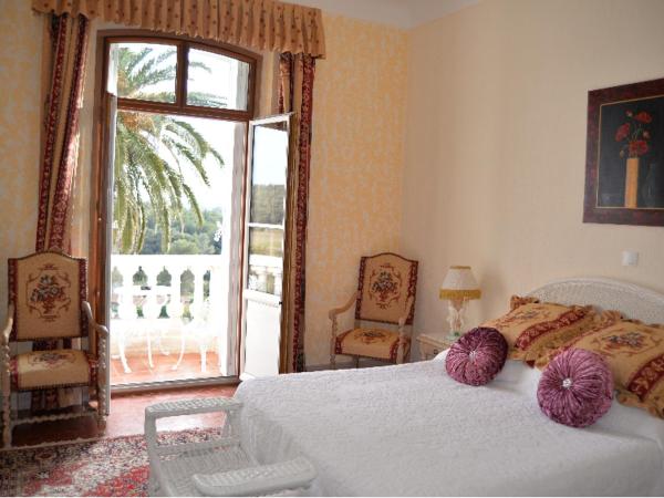 Le Château de Mei Lese : photo 2 de la chambre suite supérieure (4 adultes) avec balcon – vue sur mer