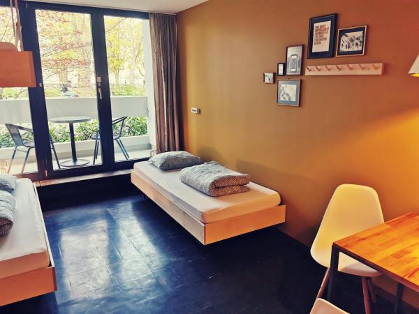 Backpackers Luzern : photo 5 de la chambre chambre triple Économique avec salle de bains commune