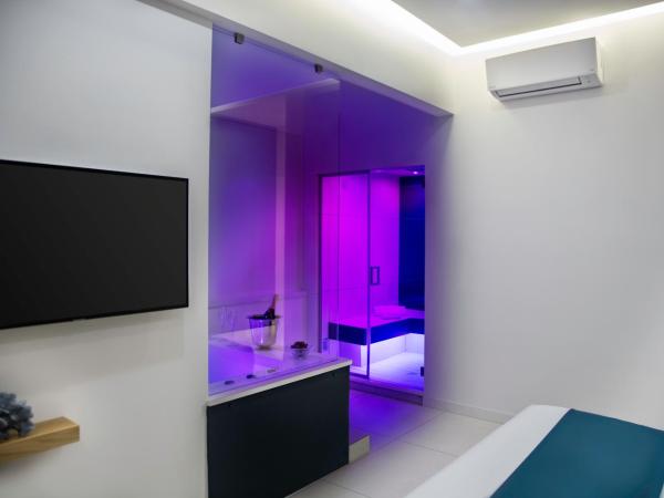 Carten : photo 9 de la chambre chambre lit king-size dépendance avec baignoire spa et sauna