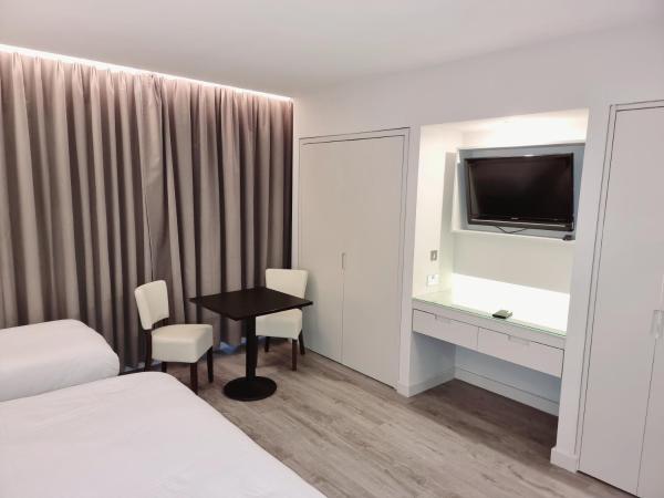 Axiom Park Hotel : photo 7 de la chambre studio triple standard