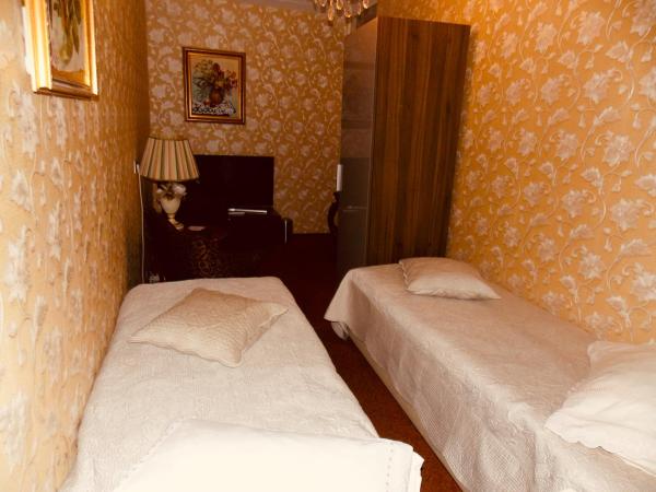 Weena House : photo 5 de la chambre petite chambre lits jumeaux