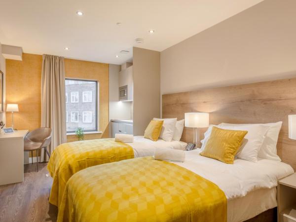 Dwell City Living : photo 3 de la chambre chambre lits jumeaux