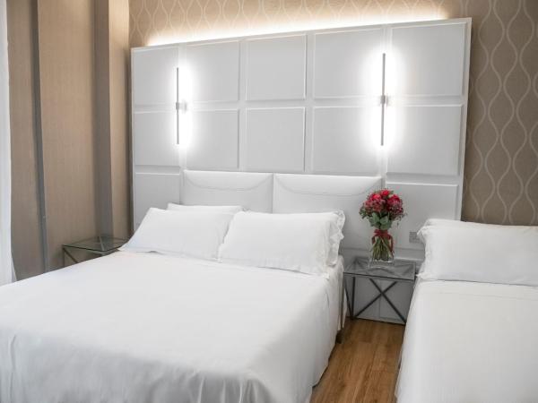 Villa Adriatica Ambienthotels : photo 4 de la chambre chambre triple supérieure