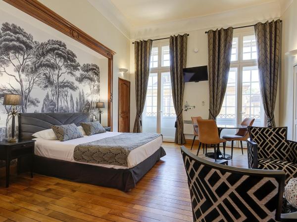 La Villa des Consuls - Gîte de tourisme de charme : photo 2 de la chambre appartement 2 chambres - rez-de-chaussée