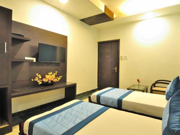 FabHotel Arihant Inn : photo 3 de la chambre chambre familiale