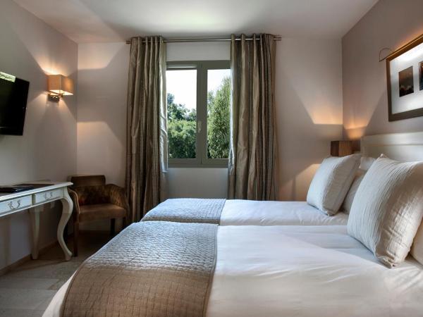 Résidence Hôtelière 4 étoiles Les Mas du Grand Vallon : photo 2 de la chambre appartement 2 chambres