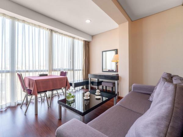 Qingdao Housing International Hotel : photo 2 de la chambre chambre lits jumeaux supérieure