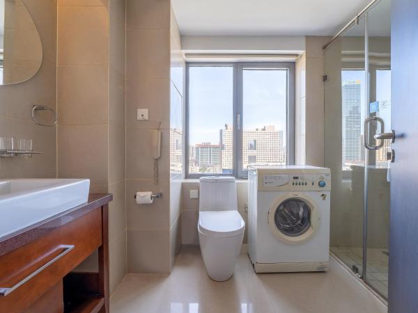 Qingdao Housing International Hotel : photo 4 de la chambre chambre double standard - vue sur ville