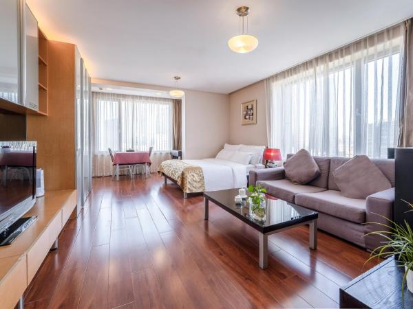 Qingdao Housing International Hotel : photo 1 de la chambre chambre double standard - vue sur ville