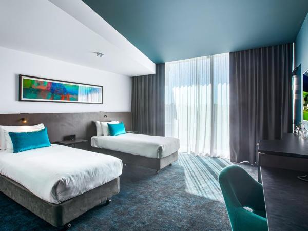 Eatons Hill Hotel : photo 1 de la chambre chambre lits jumeaux