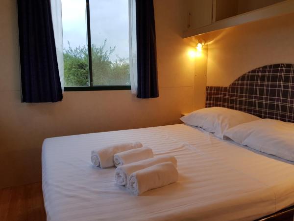 FKK Ulika - Naturist Mobile Homes Eden : photo 6 de la chambre mobile home 2 chambres avec terrasse