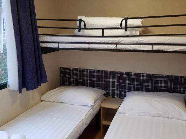 FKK Ulika - Naturist Mobile Homes Eden : photo 7 de la chambre mobile home 2 chambres avec terrasse