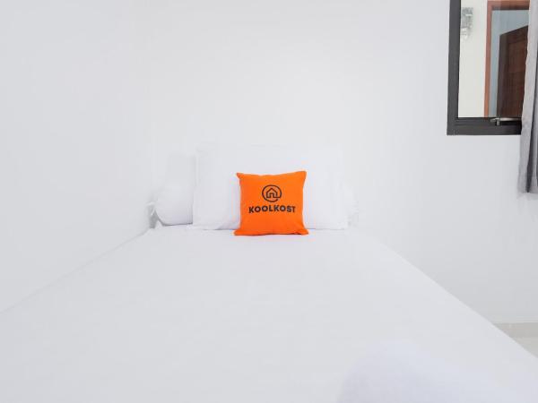 KoolKost near Jalan Veteran Raya (Minimum Stay 6 Nights) : photo 1 de la chambre chambre lits jumeaux