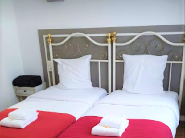 Hôtel Le Stanislas : photo 2 de la chambre chambre lits jumeaux