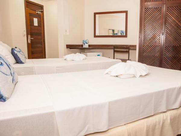 Pizzato Praia Hotel : photo 5 de la chambre chambre quadruple