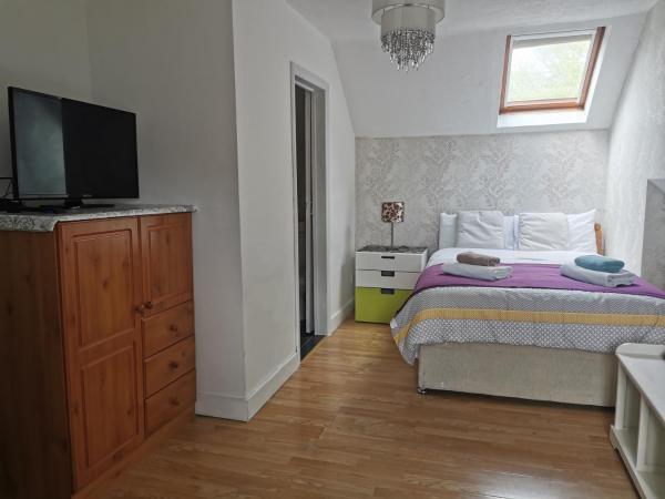 Adams Guest House : photo 3 de la chambre chambre familiale (3 adultes)